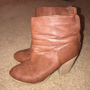 Gently used heeled boot